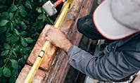 Construção - Homem realizando uma obra